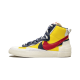 Nike Blazer Mid Sacai Snow Beach BV0072-700 Bílý/Obsidian-University Červené-Varsity Maize